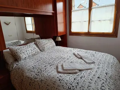 Cama o camas de una habitación en InmoCyma Pico Sayó Benasque