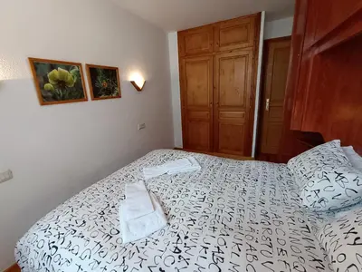 Cama o camas de una habitación en InmoCyma Pico Sayó Benasque
