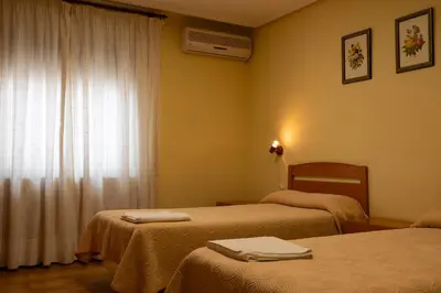 Cama o camas de una habitación en Pensión Discoves