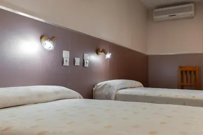 Cama o camas de una habitación en Pensión Discoves