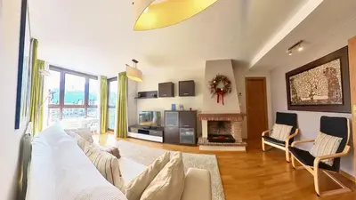 Zona de estar de La Casa de Ra - tucasaenlospirineos