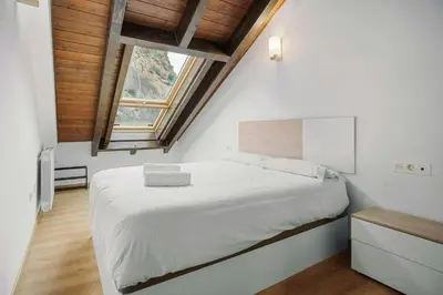 Cama o camas de una habitación en LINA by Cardi Suites.