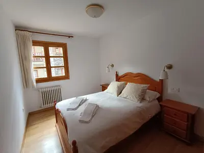 Cama o camas de una habitación en InmoCyma Pico Posets Benasque
