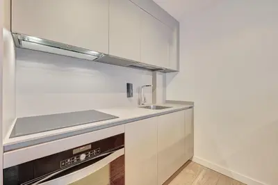 Una cocina o zona de cocina en Edificio Joya by Clabao