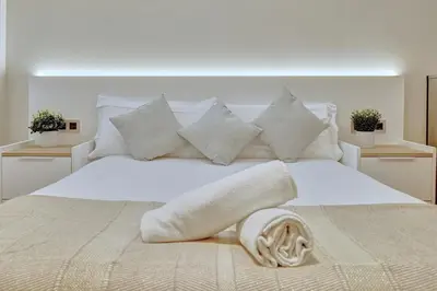 Cama o camas de una habitación en Edificio Joya by Clabao