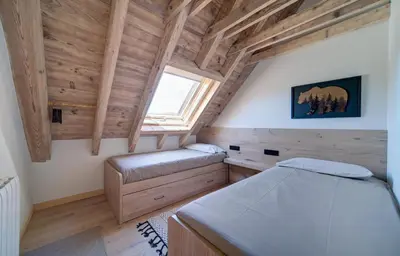 Cama o camas de una habitación en Tanau-Rentals El Oso