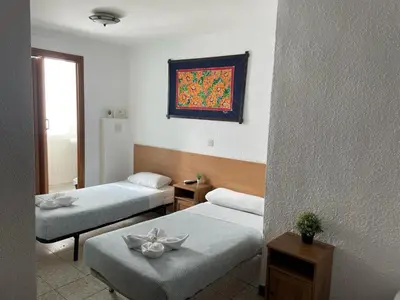 Cama o camas de una habitación en Pensión Fortea