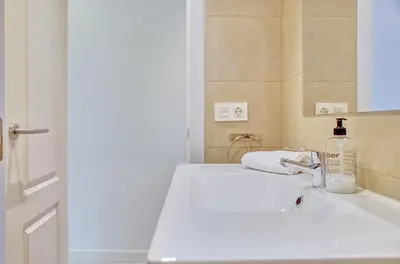 Un baño de Apartamento Burlada By Clabao
