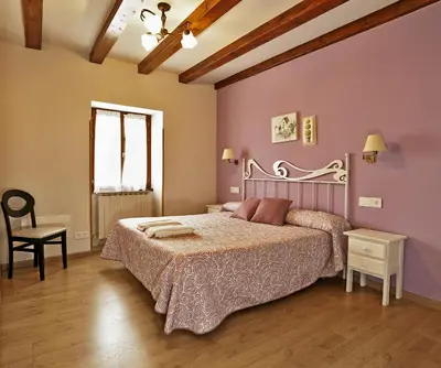 Cama o camas de una habitación en Hostal Orialde