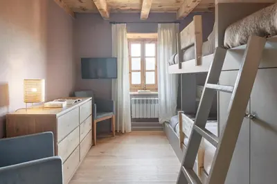 Cama o camas de una habitación en Pleta Baqueira Luxe 10 by FeelFree Rentals
