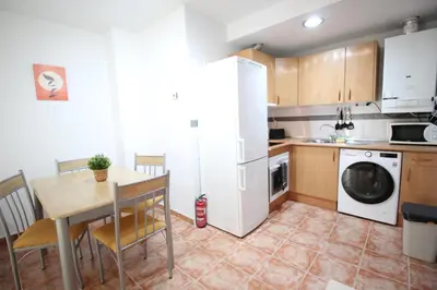 Una cocina o zona de cocina en Piso coqueto con PARKING y BALCON