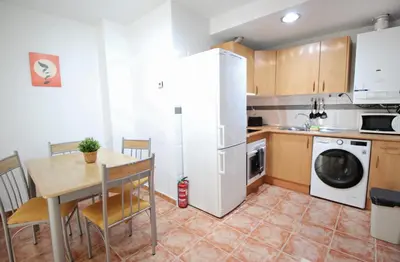 Una cocina o zona de cocina en Piso coqueto con PARKING y BALCON