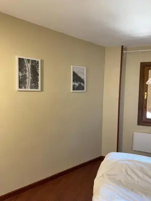 Cama o camas de una habitación en Céntrico apartamento con vistas en Formigal - Entrada 24h sin llaves