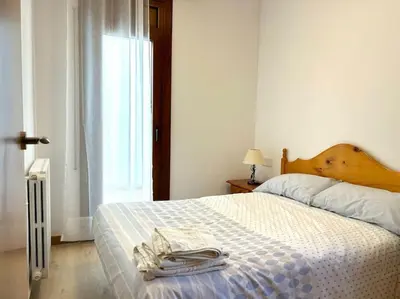 Cama o camas de una habitación en Apartament modern i cèntric Esterri by RURAL D'ÀNEU