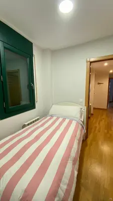 Cama o camas de una habitación en Casa Lima - Un apartamento familiar y acogedor