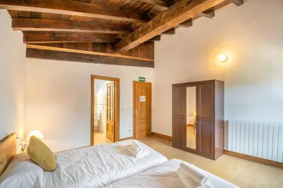 Cama o camas de una habitación en Espaciosa casa rural en pleno corazón del Baztán