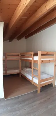 Cama o camas de una habitación en Ca la Mariana