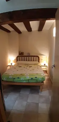 Cama o camas de una habitación en Ca la Mariana