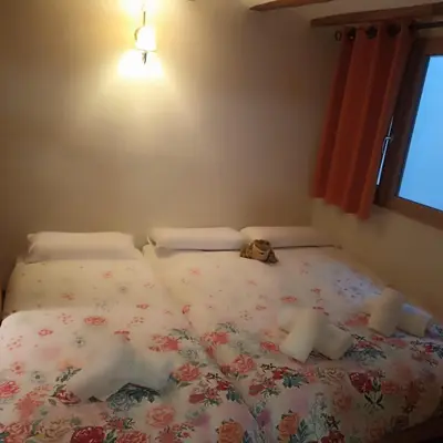 Cama o camas de una habitación en Ca la Mariana