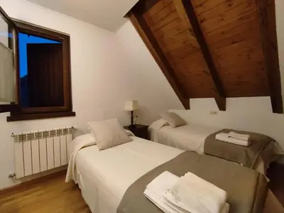 Cama o camas de una habitación en Homenfun Baqueira Beret Vielha III