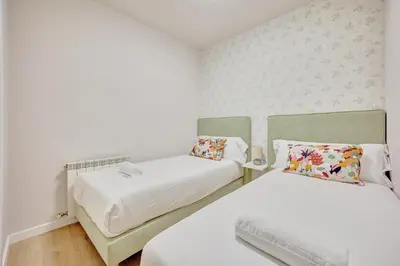 Cama o camas de una habitación en Tothom by Clabao