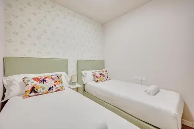 Cama o camas de una habitación en Tothom by Clabao