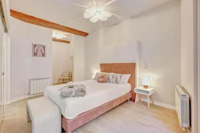 Cama o camas de una habitación en Tothom by Clabao