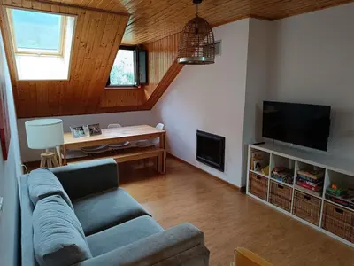 Una televisión o centro de entretenimiento en Casa Ona