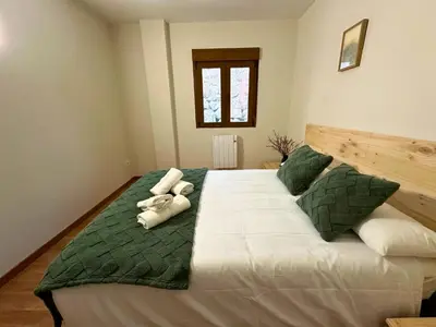 Cama o camas de una habitación en Apartamento Anayet: Formigal Centro