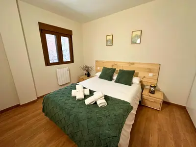 Cama o camas de una habitación en Apartamento Anayet: Formigal Centro