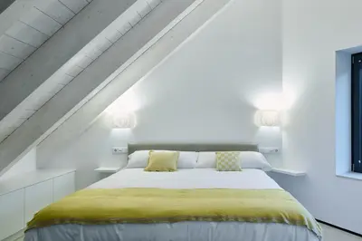 Cama o camas de una habitación en Casa de la paz en el Valle de Tena