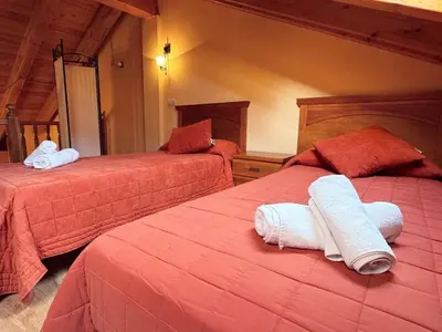Cama o camas de una habitación en Apartamentos Casa Riu - Villmor