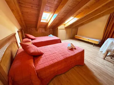 Cama o camas de una habitación en Apartamentos Casa Riu - Villmor