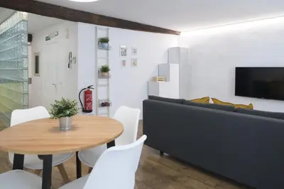 Una televisión o centro de entretenimiento en Apartamento Dormitalería