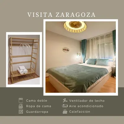 Cama o camas de una habitación en Visita Zaragoza