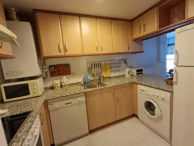 Una cocina o zona de cocina en Inmocyma Cerler-Prados de Velarta A 3 3