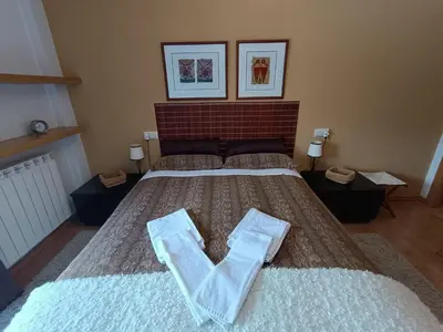 Cama o camas de una habitación en Inmocyma Cerler-Prados de Velarta A 3 3