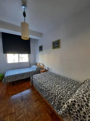 Cama o camas de una habitación en Enjoy Pirineo