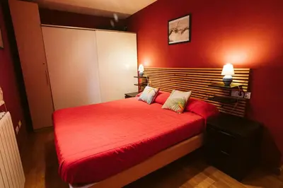 Cama o camas de una habitación en refugio Tramacastilla - WOW RURAL