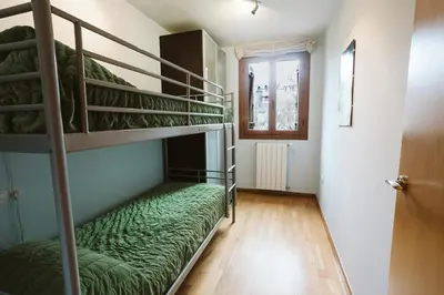 Cama o camas de una habitación en refugio Tramacastilla - WOW RURAL
