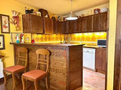 Una cocina o zona de cocina en Apartament dúplex amb gran terrassa by RURAL D'ÀNEU