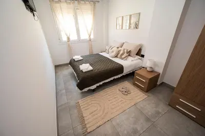 Cama o camas de una habitación en Apartamentos Alegre