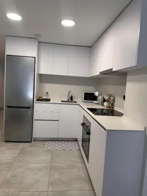 Una cocina o zona de cocina en Apartamentos Alegre