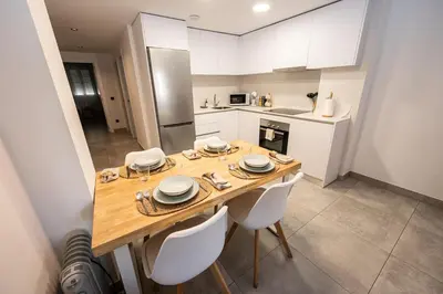 Una cocina o zona de cocina en Apartamentos Alegre
