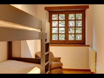 Cama o camas de una habitación en CASA SALIENT de Alma de Nieve