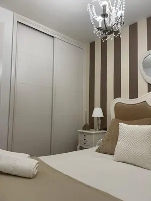 Cama o camas de una habitación en Apartamento Balcón a la Basílica del Pilar