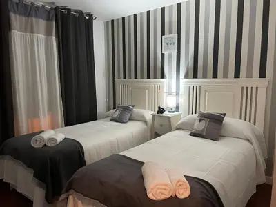 Cama o camas de una habitación en Apartamento Balcón a la Basílica del Pilar