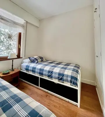 Cama o camas de una habitación en Acogedor apartamento a pie de pistas, Baqueira 1500