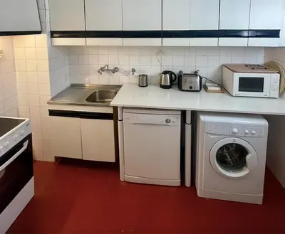 Una cocina o zona de cocina en Acogedor apartamento a pie de pistas, Baqueira 1500