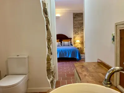 Cama o camas de una habitación en Cal Carlà de Belltall